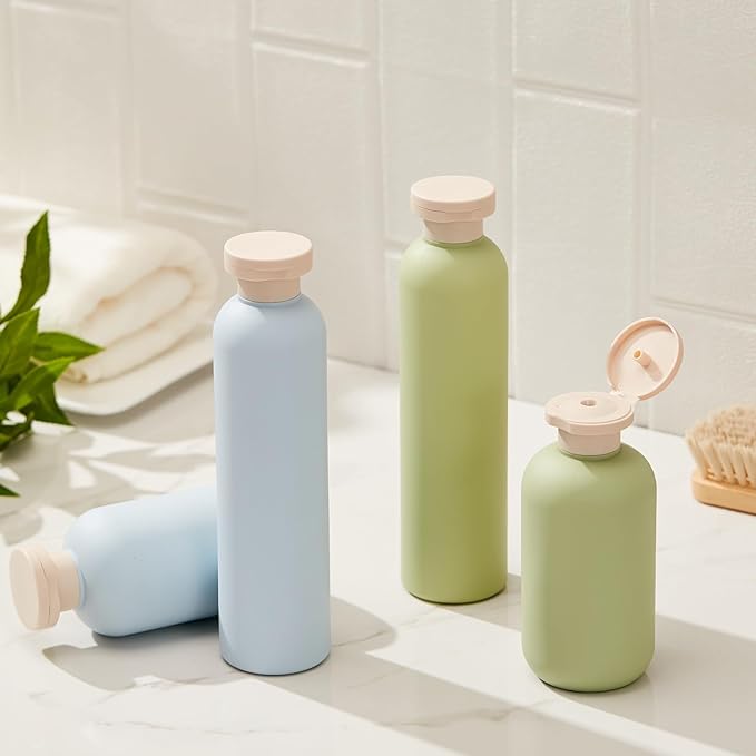 Qeuly Squeeze Bottles with Pump Dispenser and Flip Cap, 8.8 oz Refillable Travel Containers for Toiletries, Plastic Travel Shampoo and Conditioner Bottles (Blue 260)