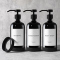 GMISUN Plastic Shampoo and Conditioner Dispenser with Silicone Sleeves, 21 oz Black Shower Soap Dispenser Bottles with Labels, Refillable Shampoo Conditioner Body Wash Dispensers Set of 3